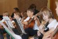 Meherer Kinder spielen im Gitarrenorchester